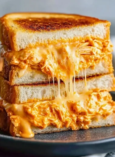 Buffalo Chicken Grilled Cheese Sandwich served with crispy edges and melted cheese
