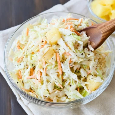 Bowl of colorful Hawaiian Coleslaw with pineapple and cabbage
