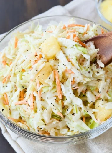 Bowl of colorful Hawaiian Coleslaw with pineapple and cabbage