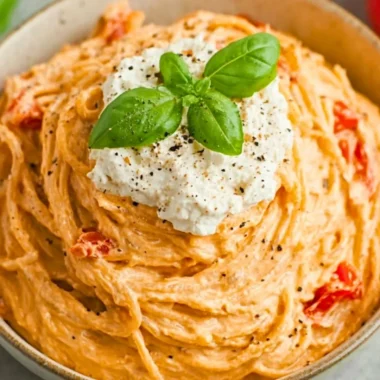 Delicious roasted tomato and garlic ricotta pasta served in a bowl