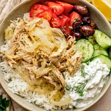 Slow cooker Greek chicken served with vegetables and herbs