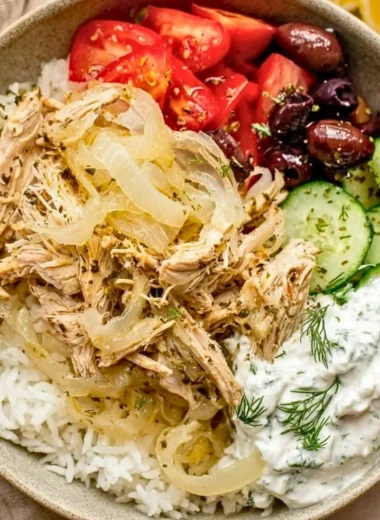 Slow cooker Greek chicken served with vegetables and herbs