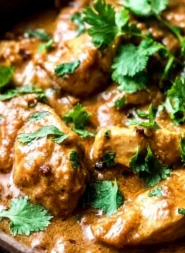 Slow Cooker Thai Peanut Chicken served with rice and vegetables