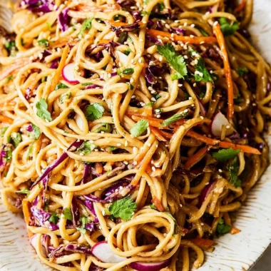 Delicious Asian noodle salad tossed in creamy peanut dressing