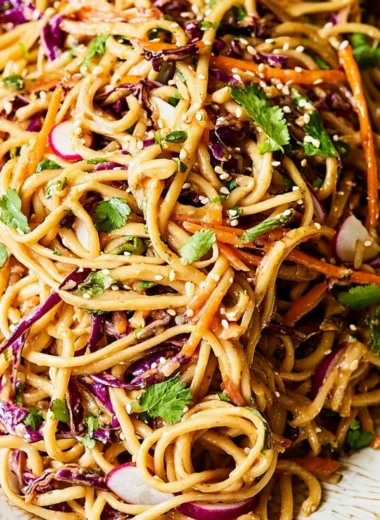 Delicious Asian noodle salad tossed in creamy peanut dressing