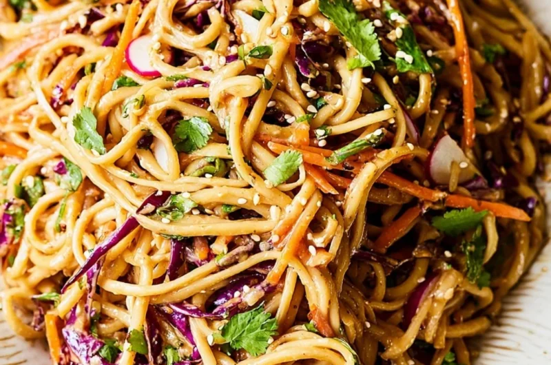 Delicious Asian noodle salad tossed in creamy peanut dressing