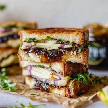 Brie, Fig, and Apple Grilled Cheese sandwich with golden brown crust