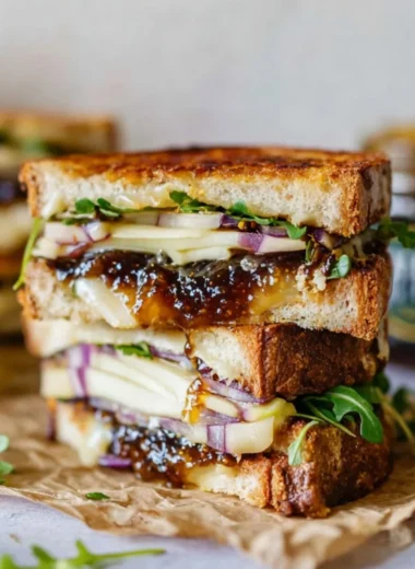 Brie, Fig, and Apple Grilled Cheese sandwich with golden brown crust