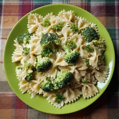 Delicious Broccoli Alfredo Pasta served in a bowl with a creamy sauce