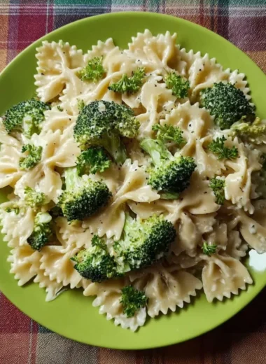 Delicious Broccoli Alfredo Pasta served in a bowl with a creamy sauce
