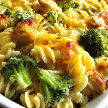 Baked Cheesy Broccoli Chicken Noodle Casserole in a casserole dish