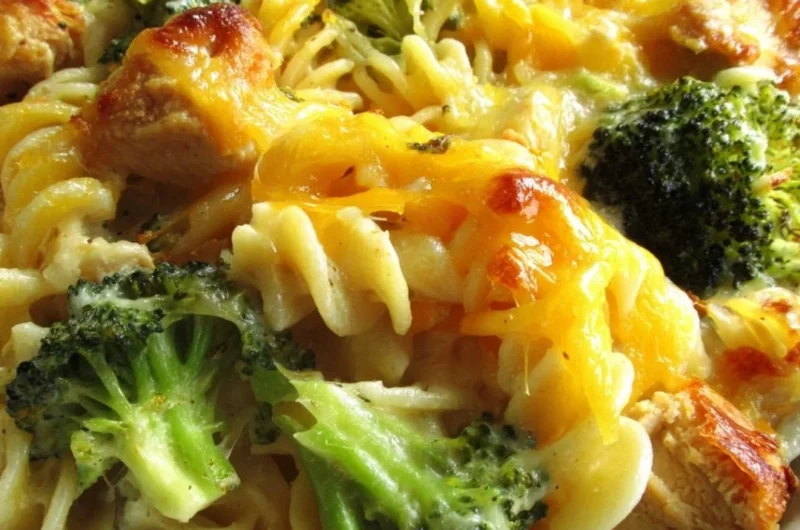 Baked Cheesy Broccoli Chicken Noodle Casserole in a casserole dish
