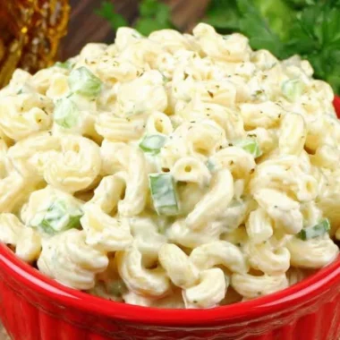 Deli-style macaroni salad in a bowl, garnished and ready to serve.