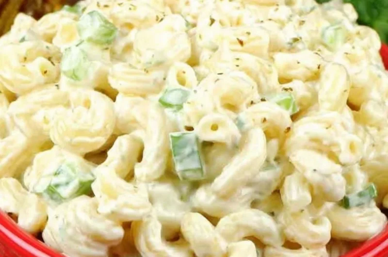 Deli-style macaroni salad in a bowl, garnished and ready to serve.