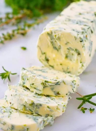 Delicious homemade garlic butter spread on fresh bread slices