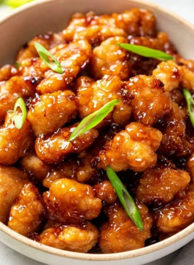Delicious Honey Butter Chicken served with a side of crispy fries