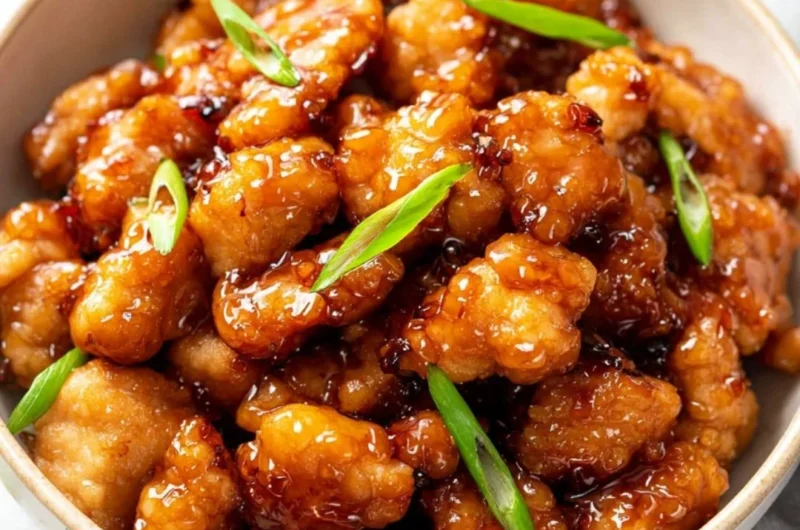 Delicious Honey Butter Chicken served with a side of crispy fries