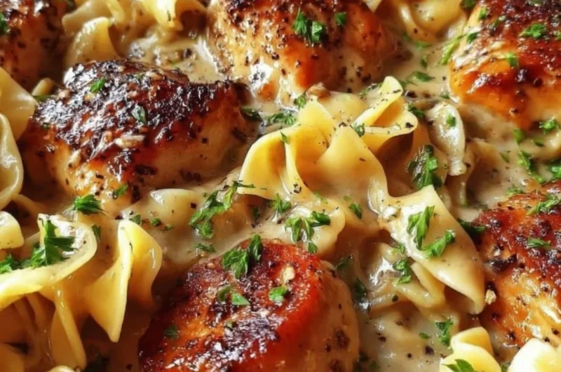 One-Pan Creamy Garlic Butter Chicken served with egg noodles.