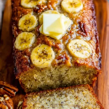 Delicious slice of banana bread on a wooden table