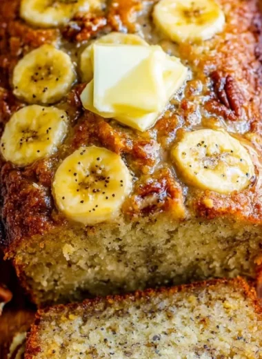 Delicious slice of banana bread on a wooden table