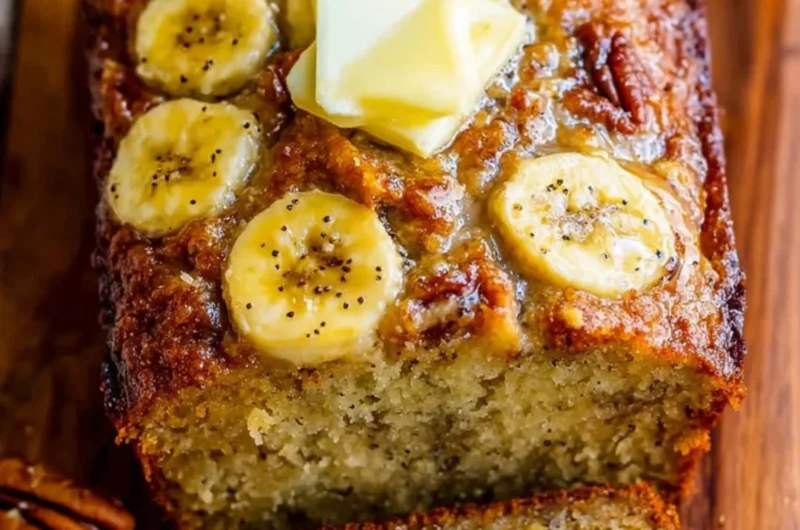 Delicious slice of banana bread on a wooden table