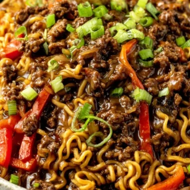 Delicious beef ramen noodles stir fry served in a bowl with fresh vegetables