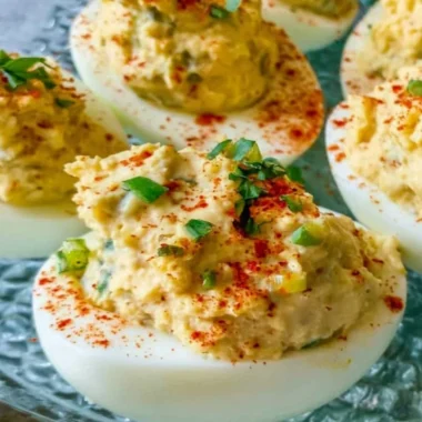 Plate of flavorful Cajun Deviled Eggs with a spicy seasoning