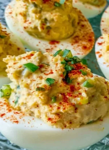 Plate of flavorful Cajun Deviled Eggs with a spicy seasoning