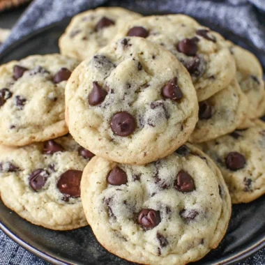 Plate of chocolate chip yogurt cookies with chocolate chips and yogurt background
