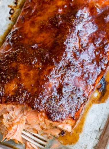 Delicious easy five ingredient baked salmon recipe on a plate.