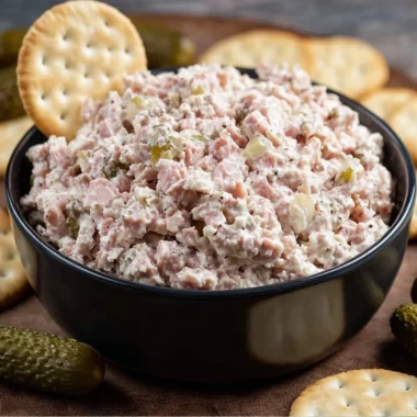 Delicious ham salad served in a bowl with fresh ingredients