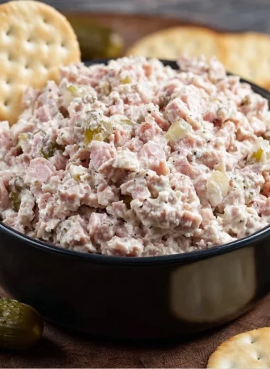 Delicious ham salad served in a bowl with fresh ingredients