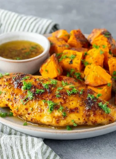 Honey Garlic Chicken Tenders with a savory glaze served on a plate