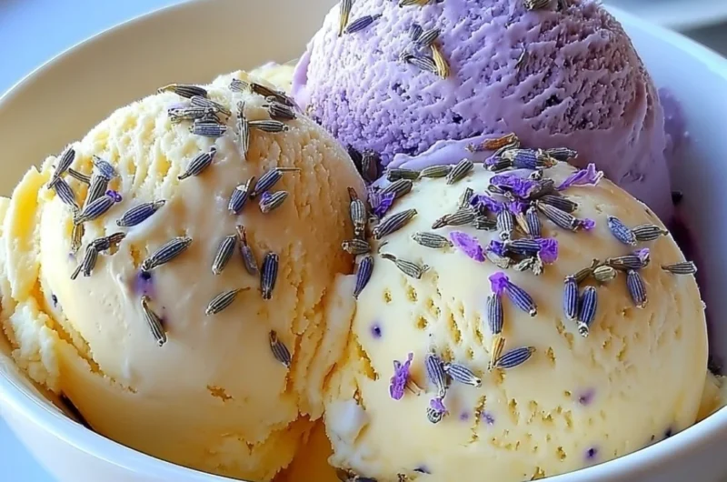 Delicious bowl of Lavender Honey Ice Cream with lavender sprigs