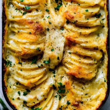 Delicious scalloped potatoes baked with cheese and cream