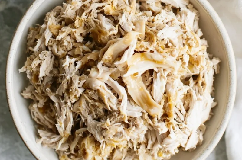 Delicious shredded chicken dish served with herbs and spices