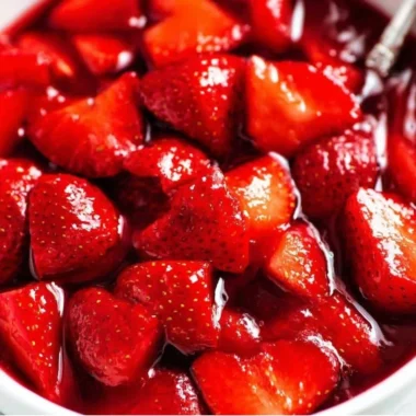 Delicious homemade strawberry sauce drizzled over dessert