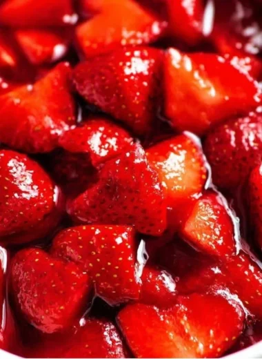 Delicious homemade strawberry sauce drizzled over dessert