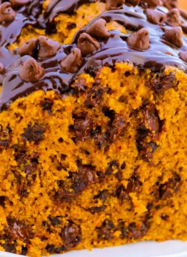 Moist and delicious chocolate chip pumpkin bread slice on a plate