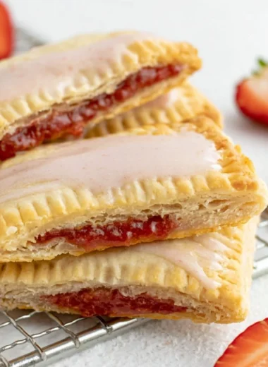 Cozy homemade sourdough pop tarts with fruit filling and frosting