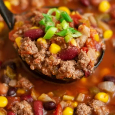 Bowl of Cozy Santa Fe Taco Soup garnished with cilantro and avocado
