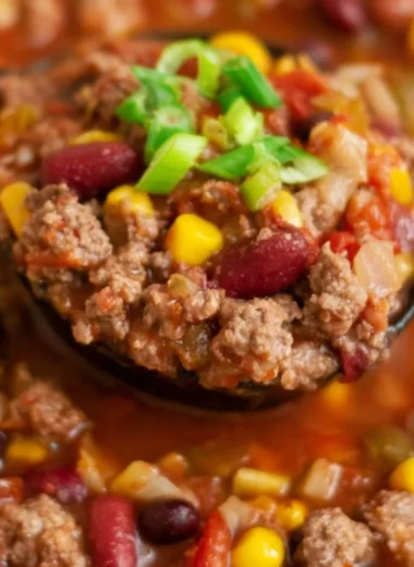 Bowl of Cozy Santa Fe Taco Soup garnished with cilantro and avocado