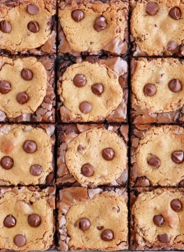 Delicious brookie bars made with brownie mix and cookie dough on a plate.