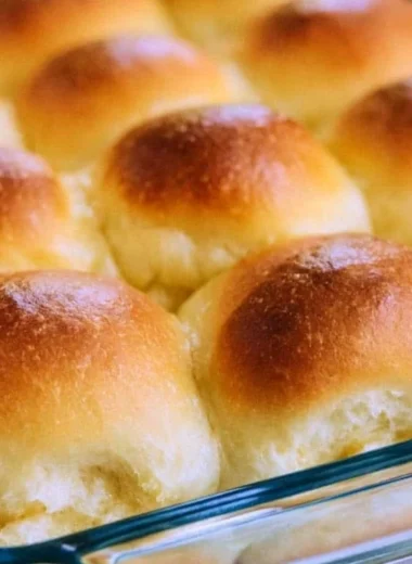 Warm and fluffy old fashioned yeast rolls served fresh from the oven.