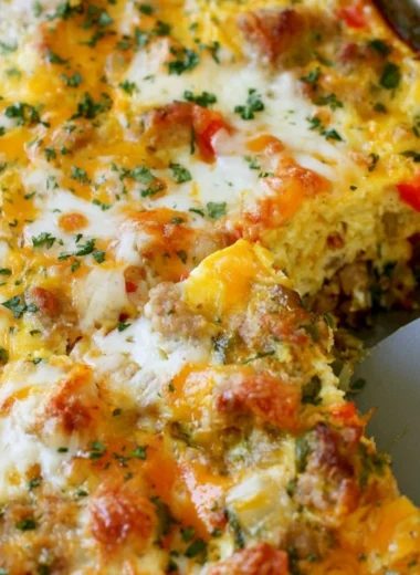 Healthy breakfast featuring turkey sausage and scrambled eggs on a plate