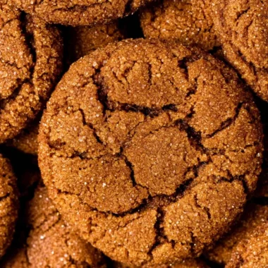 Chewy gingersnap cookies freshly baked and ready to enjoy.