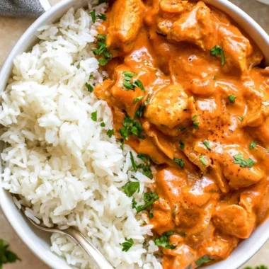 Delicious Coconut Chicken Rice Bowl with chicken, rice, and coconut sauce