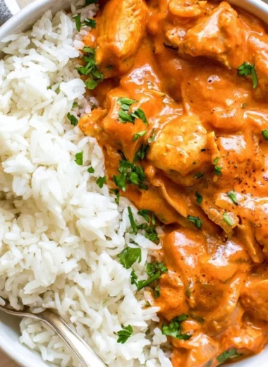 Delicious Coconut Chicken Rice Bowl with chicken, rice, and coconut sauce