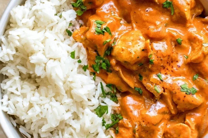 Delicious Coconut Chicken Rice Bowl with chicken, rice, and coconut sauce