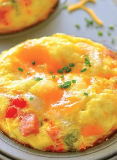 Denver omelet muffins baked with peppers, onions, and cheese
